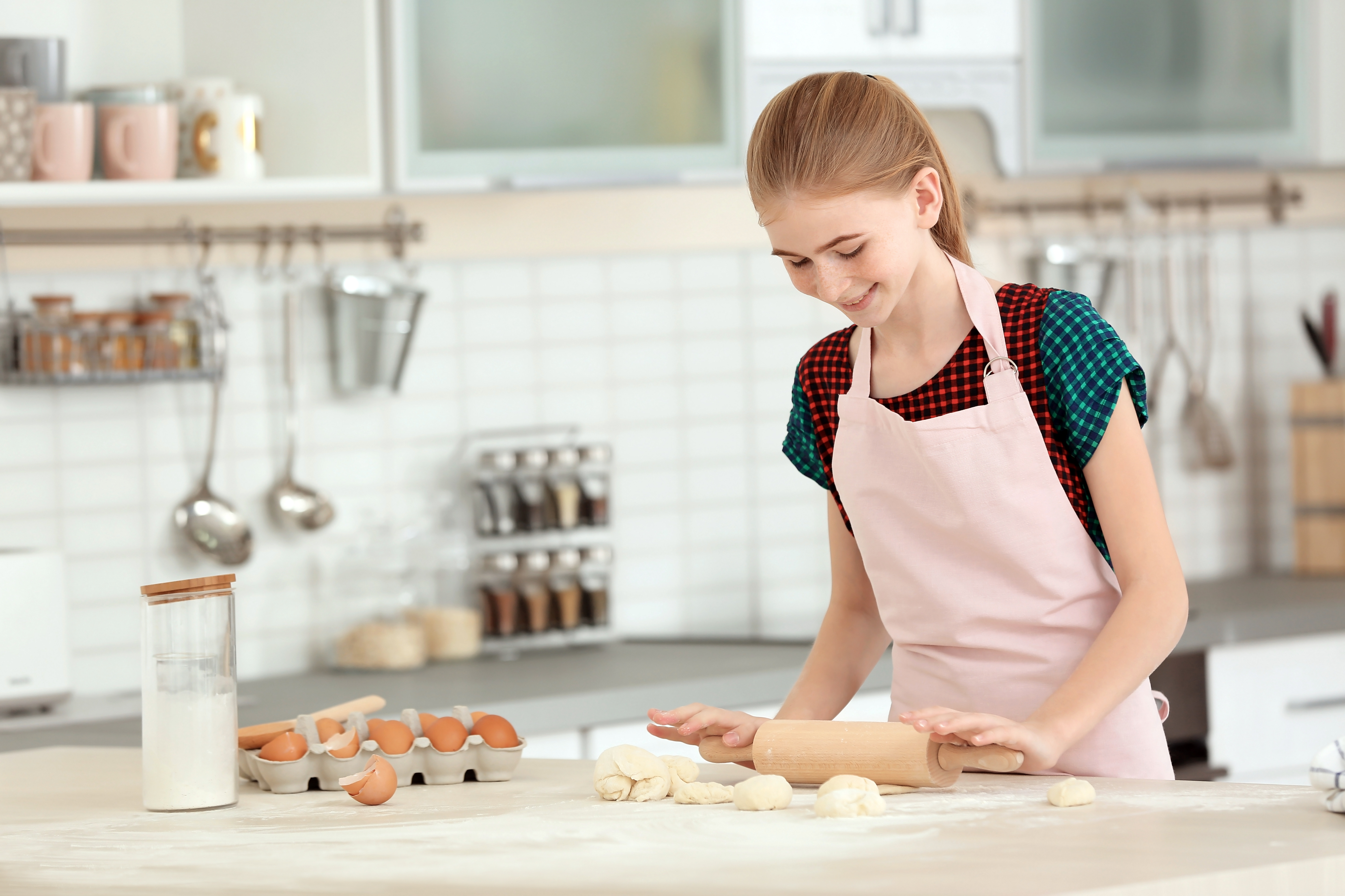 girl cooking in kitchen