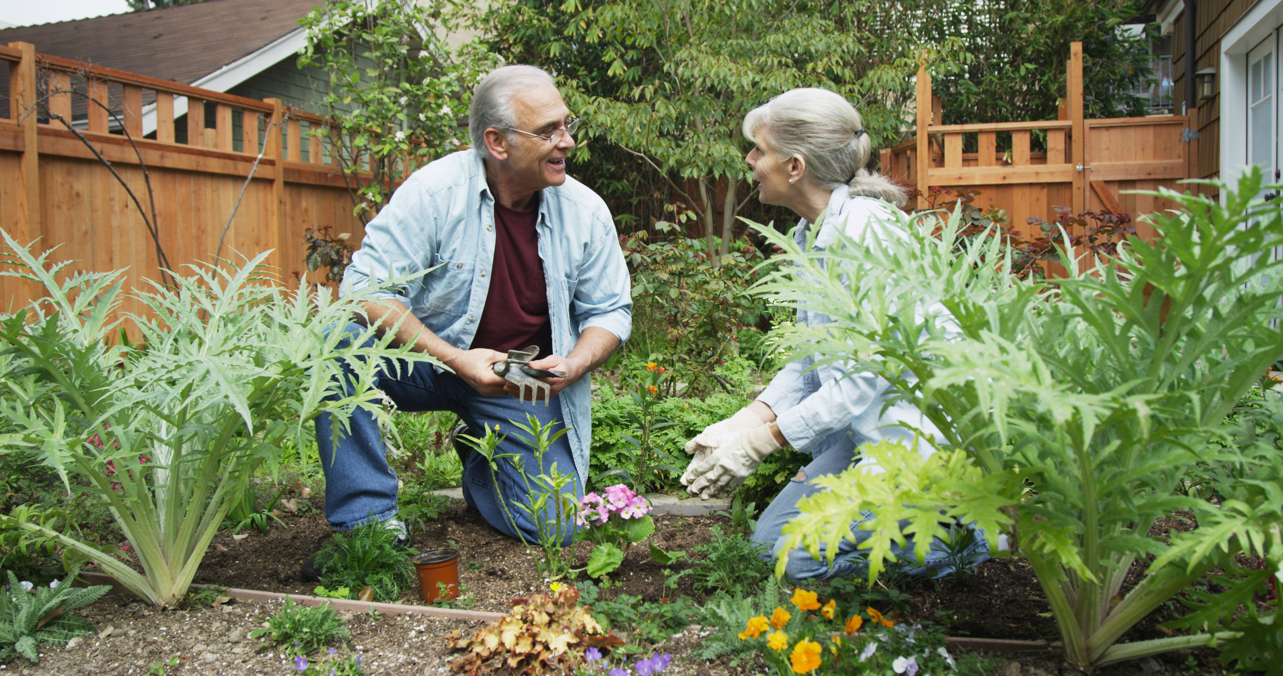man and women gardening
