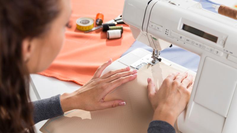 Picture women using sewing machine